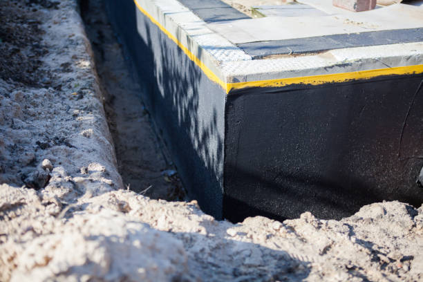 Professional Waterproofing technician working in Ducktown, TN